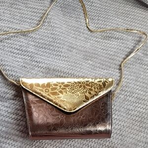 Elegant Gold and Silver Floral Clutch